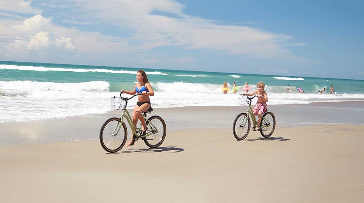 People biking on the beach in Hilton Head
